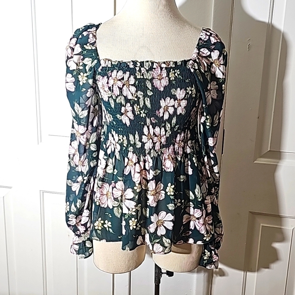 APRICOT, fairy style top. Smocking, long sleeves. Green with floral. Size 8.